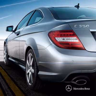 C Couple Cars Puzzle logo